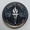 Picture of 1973 Republic of Minerva $35 .999 Silver Coin w/ 10gr 24k Inlay 